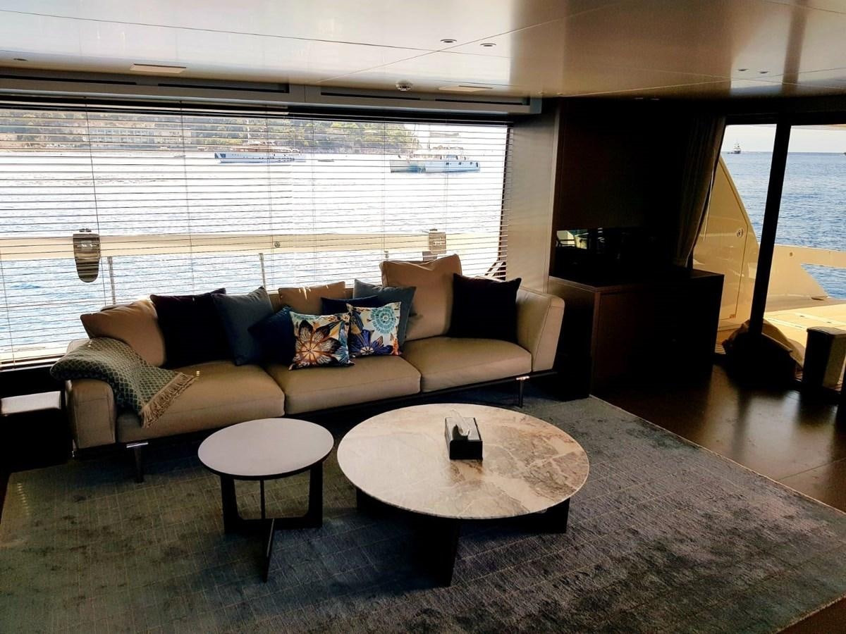 a living room with a couch and a coffee table aboard 2020 SANLORENZO SX88 #43 Yacht for Sale