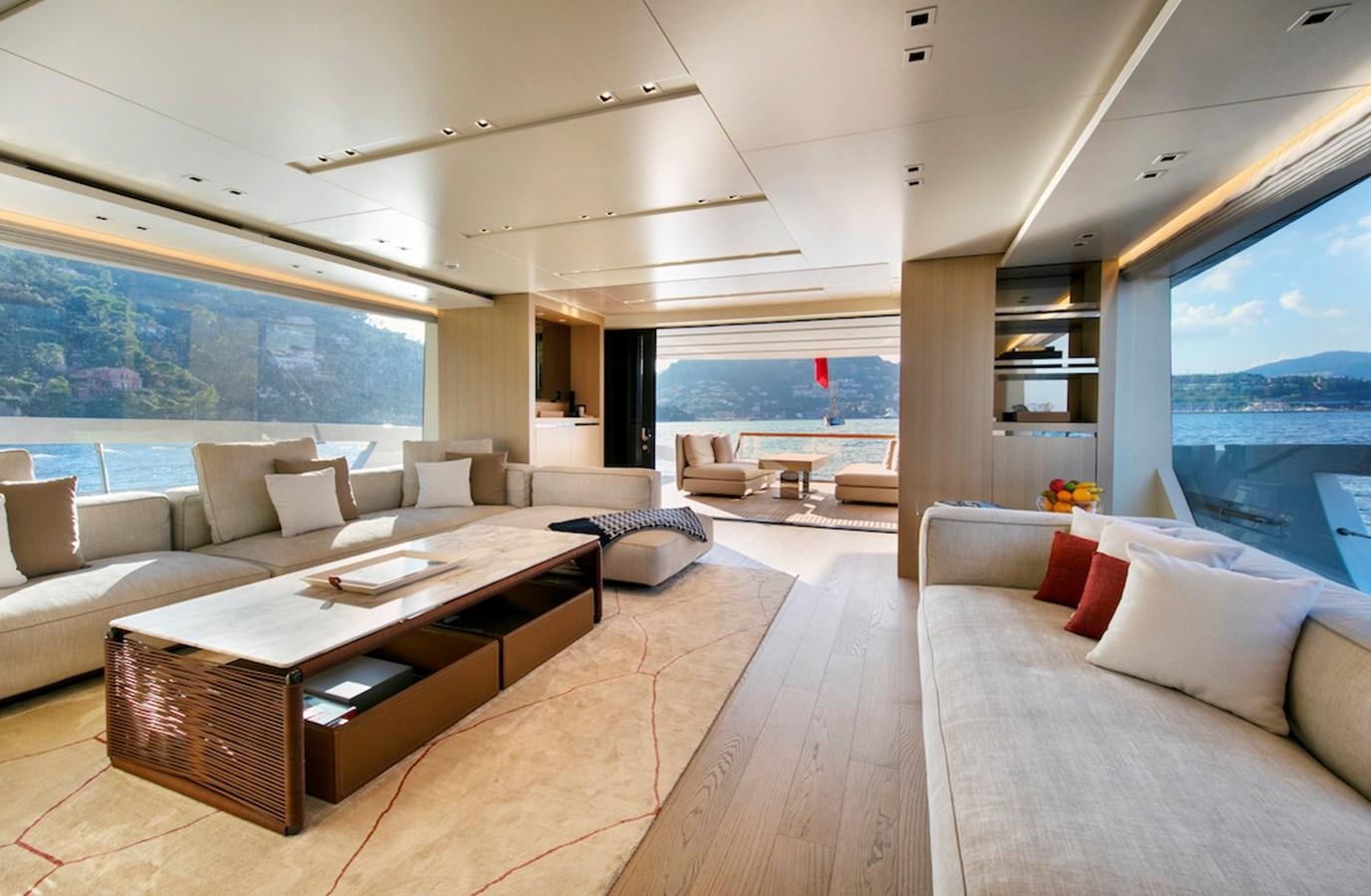 a living room with a large window aboard SX88 Yacht for Sale