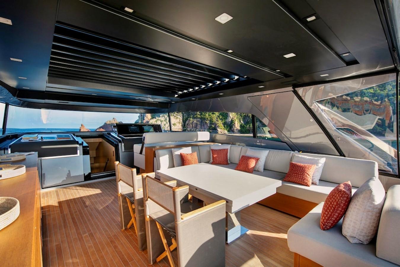 a room with a couch and a table and chairs aboard SX88 Yacht for Sale