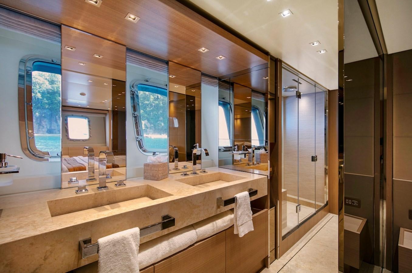 a bathroom with a large mirror aboard SX88 Yacht for Sale