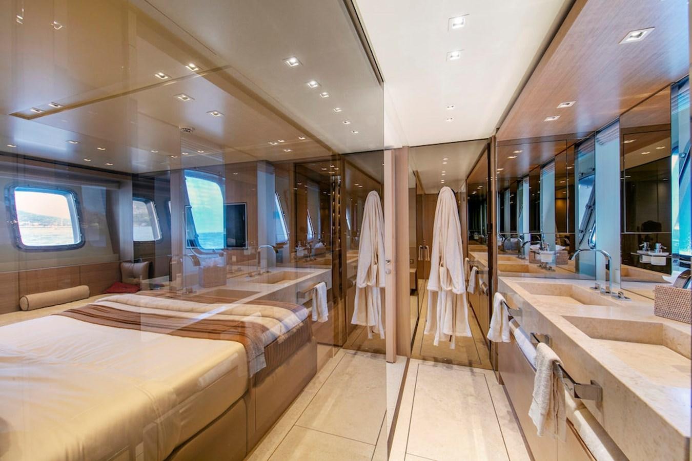 a room with beds and a window aboard SX88 Yacht for Sale