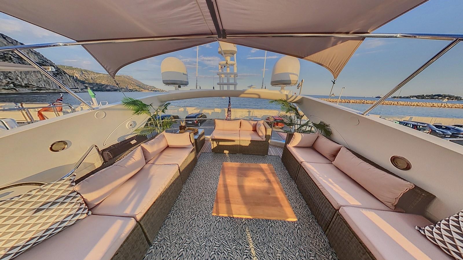 a tent with lounge chairs and a pool aboard TOFUN Yacht for Sale