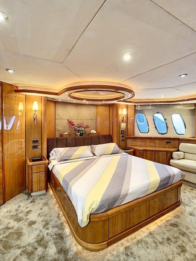 a bed in a room aboard TOFUN Yacht for Sale