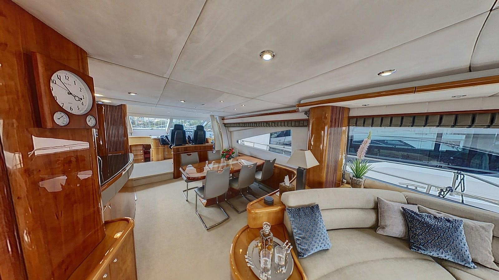 a living room with a large window aboard TOFUN Yacht for Sale