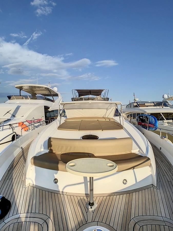 a boat on a deck aboard TOFUN Yacht for Sale