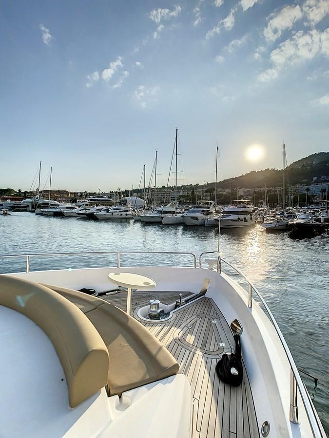 a boat is parked in the water aboard TOFUN Yacht for Sale