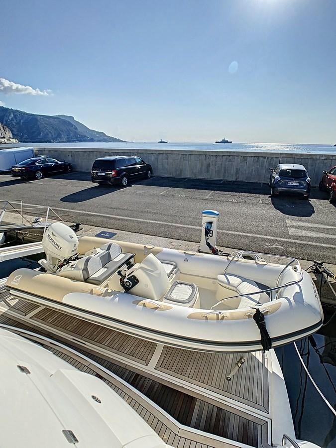 a car parked on a road aboard TOFUN Yacht for Sale