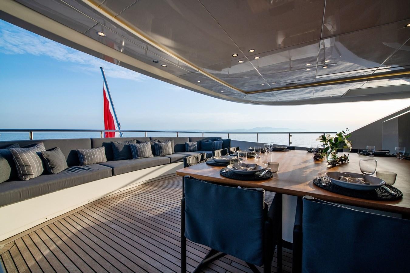 a large room with a couch and a table aboard ZIA Yacht for Sale