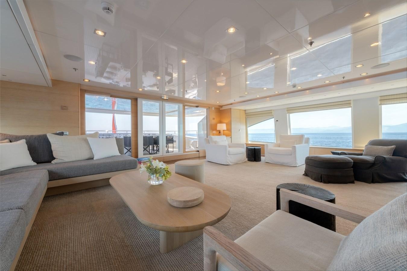 a living room with a large window aboard ZIA Yacht for Sale
