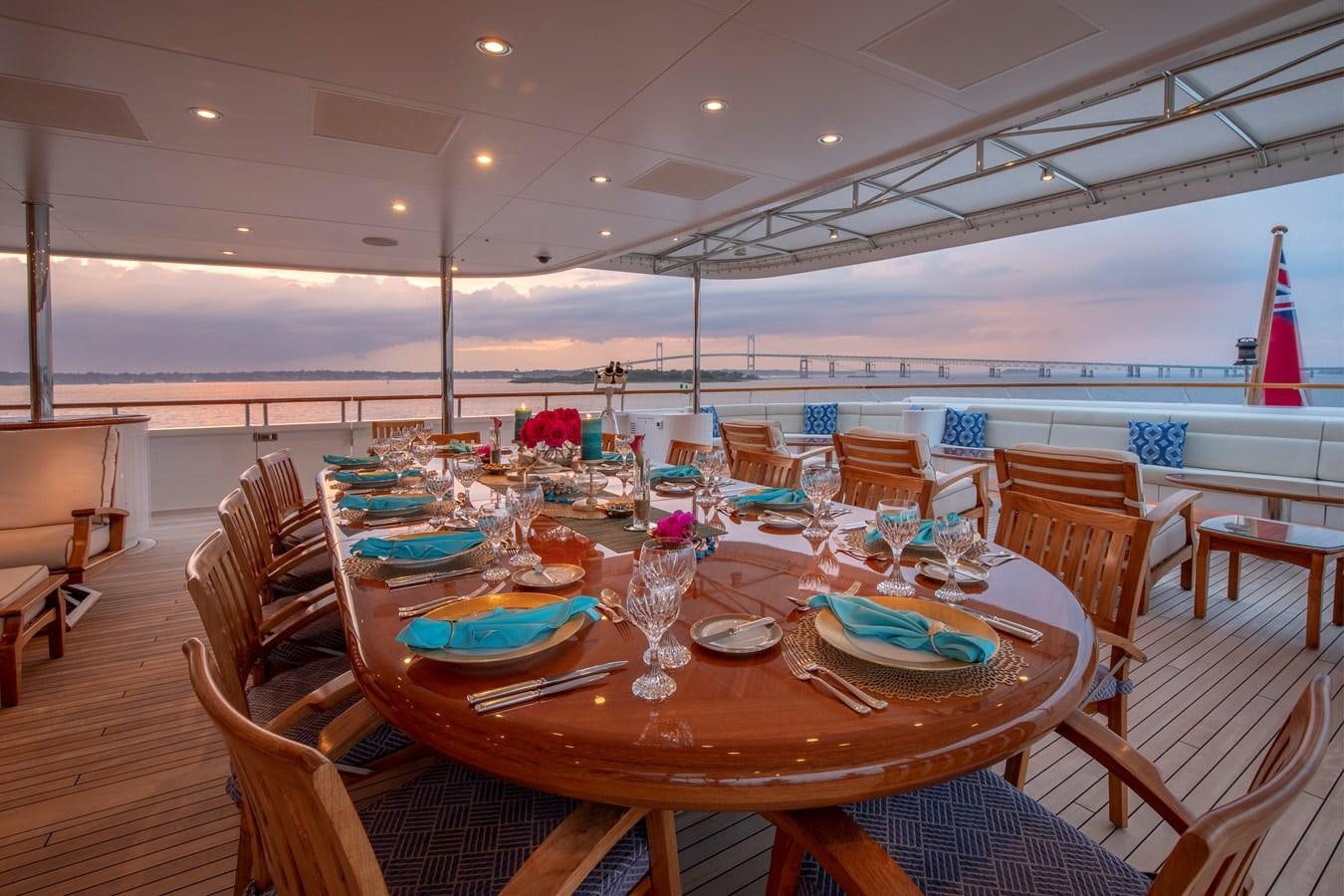 a table set for a dinner party aboard LAUREL Yacht for Sale