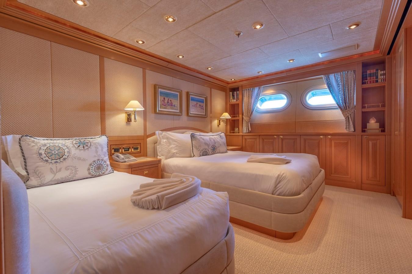 a room with two beds aboard LAUREL Yacht for Sale