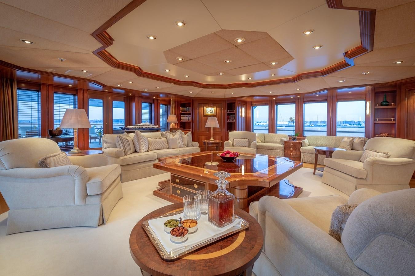 a living room with a large window aboard LAUREL Yacht for Sale