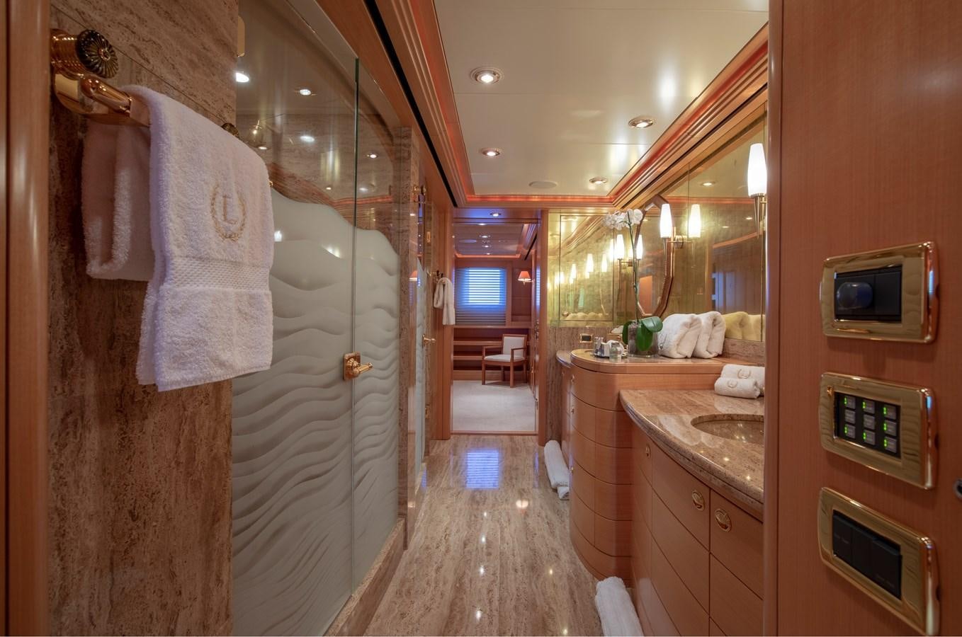 a bathroom with a shower and a sink aboard LAUREL Yacht for Sale