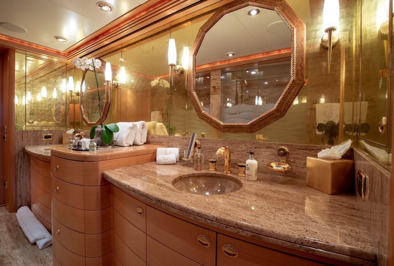 a bathroom with a large mirror aboard LAUREL Yacht for Sale