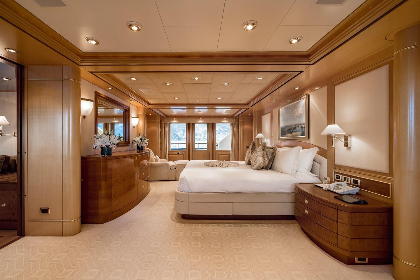 a large bedroom with a large bed aboard LAUREL Yacht for Sale