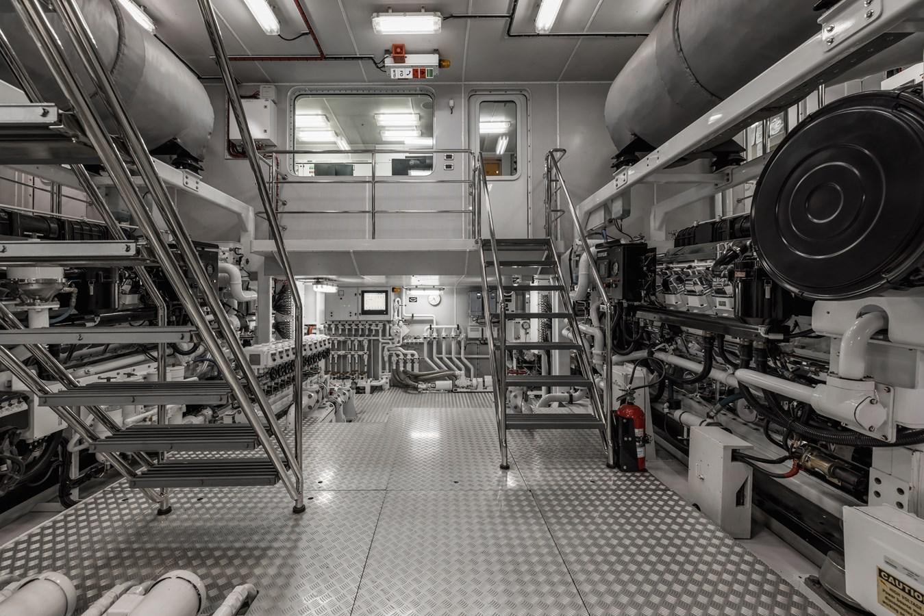 a large room with large machinery aboard LAUREL Yacht for Sale