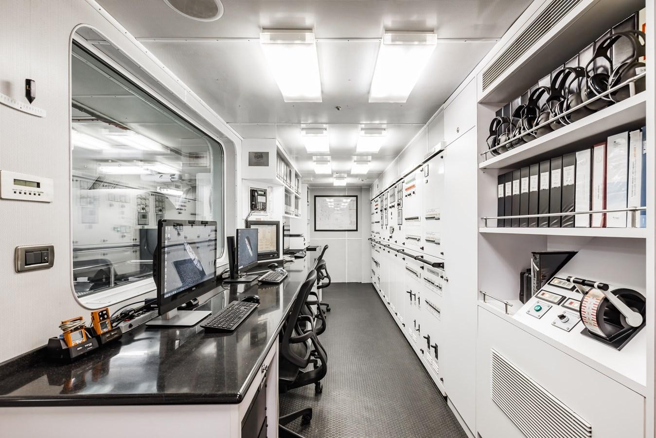 a room with computers and equipment aboard LAUREL Yacht for Sale