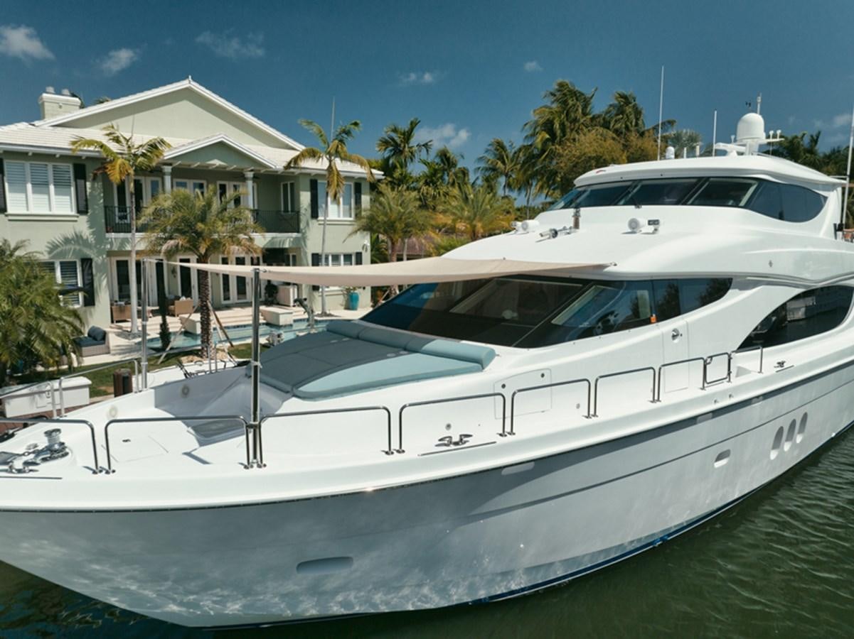 a white yacht parked in a driveway aboard DONE DEAL Yacht for Sale
