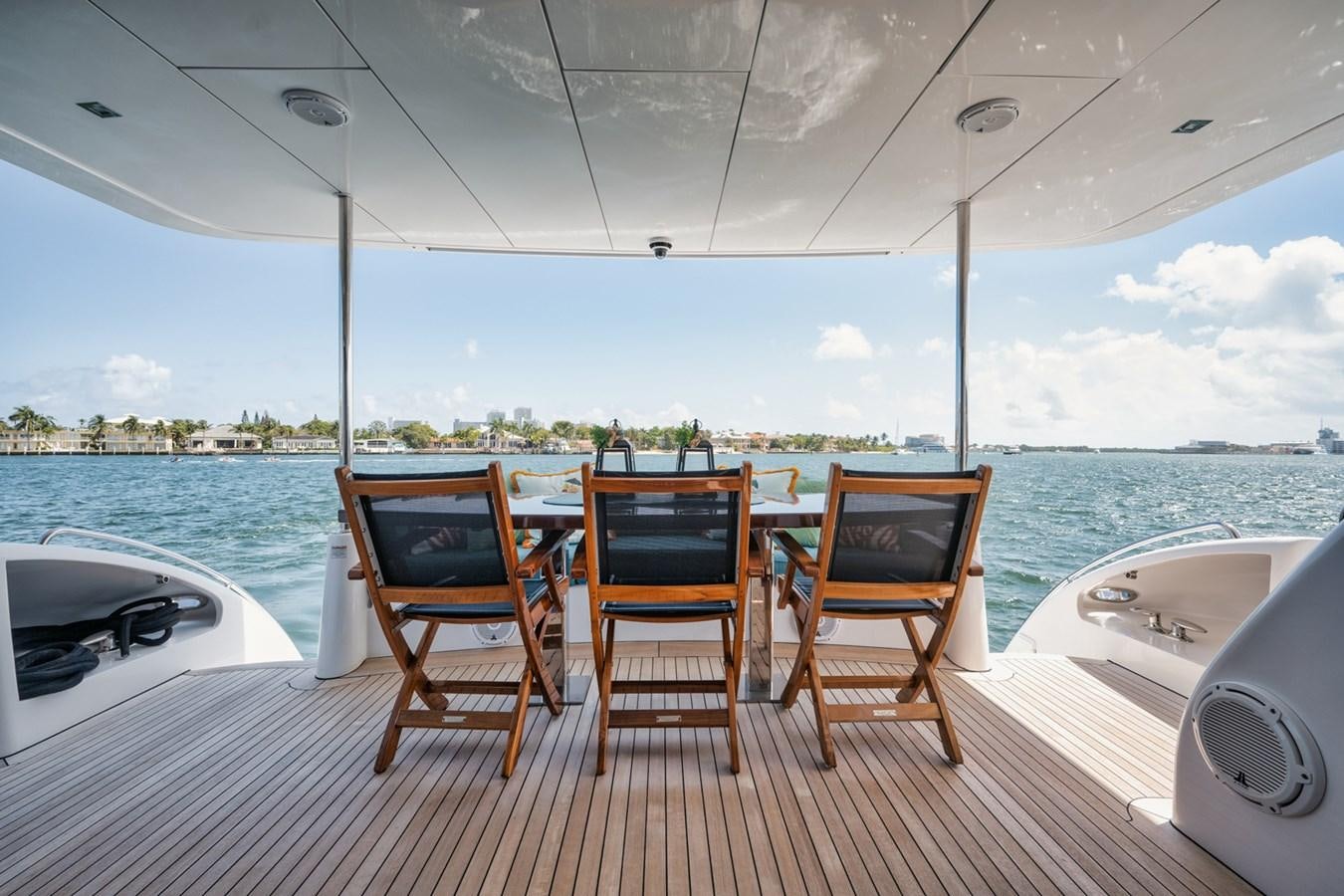 a group of chairs on a deck aboard DONE DEAL Yacht for Sale