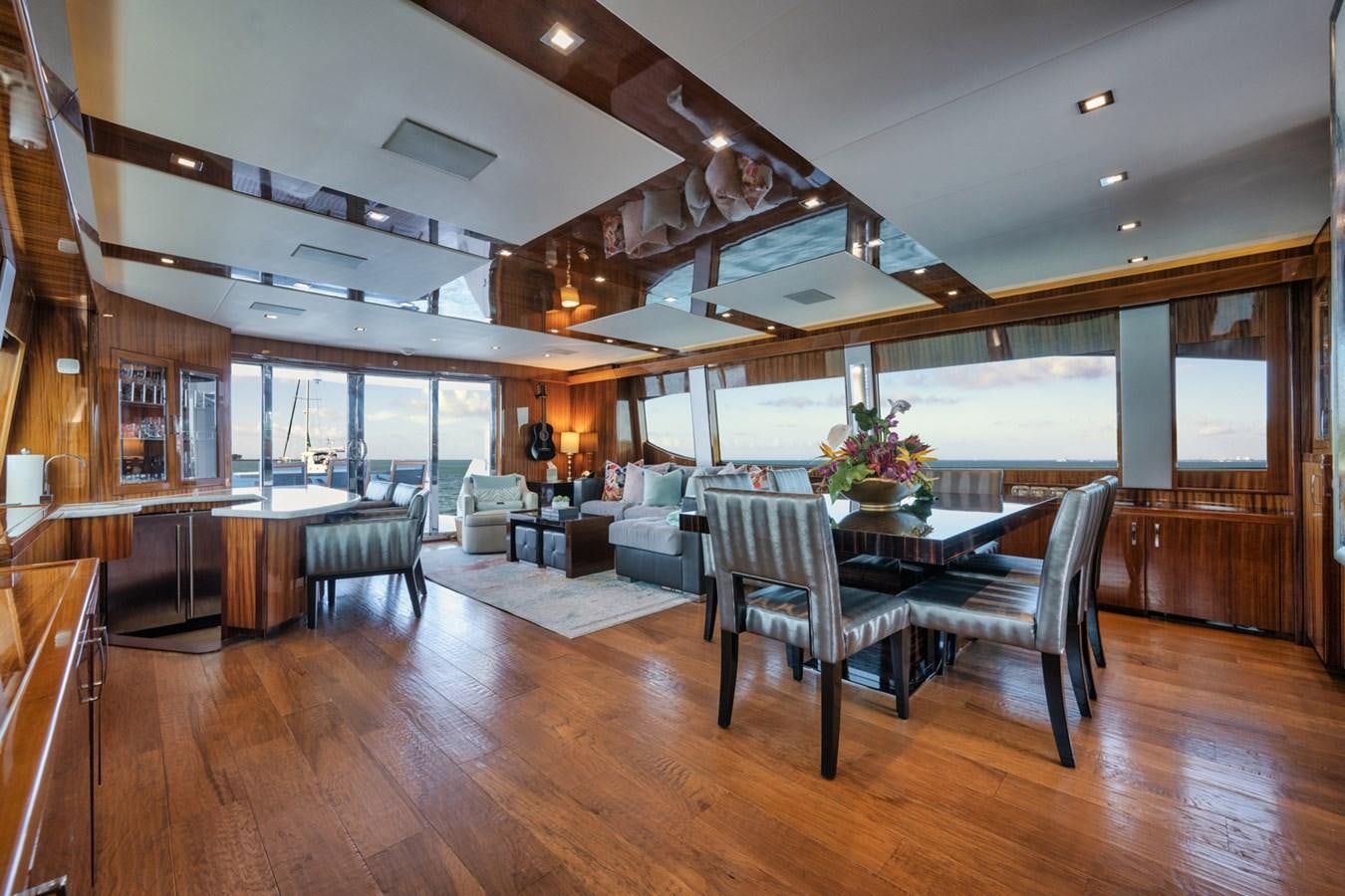 a room with a table and chairs aboard DONE DEAL Yacht for Sale