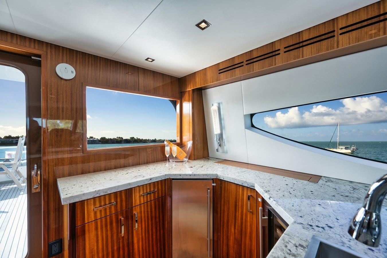 a kitchen with a large window aboard DONE DEAL Yacht for Sale