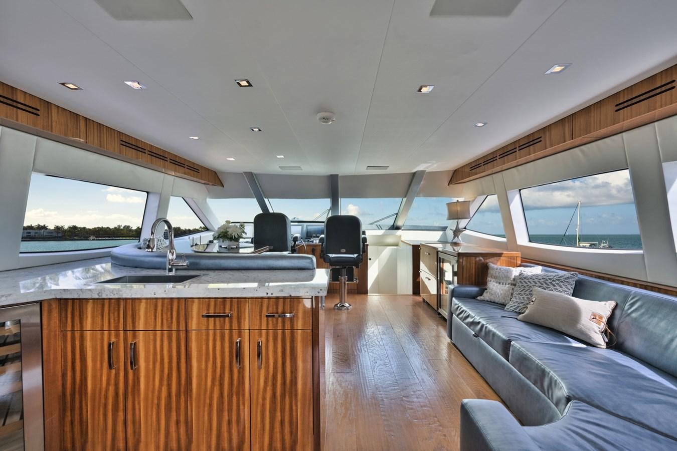 a large room with a couch and a sink in it aboard DONE DEAL Yacht for Sale