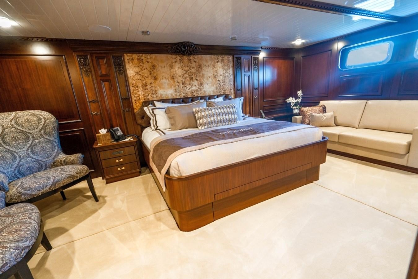 a bed in a room aboard DRAMA QUEEN Yacht for Sale