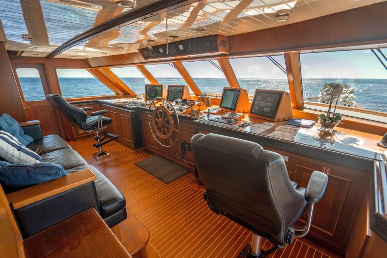 a room with a couch and a computer aboard DRAMA QUEEN Yacht for Sale