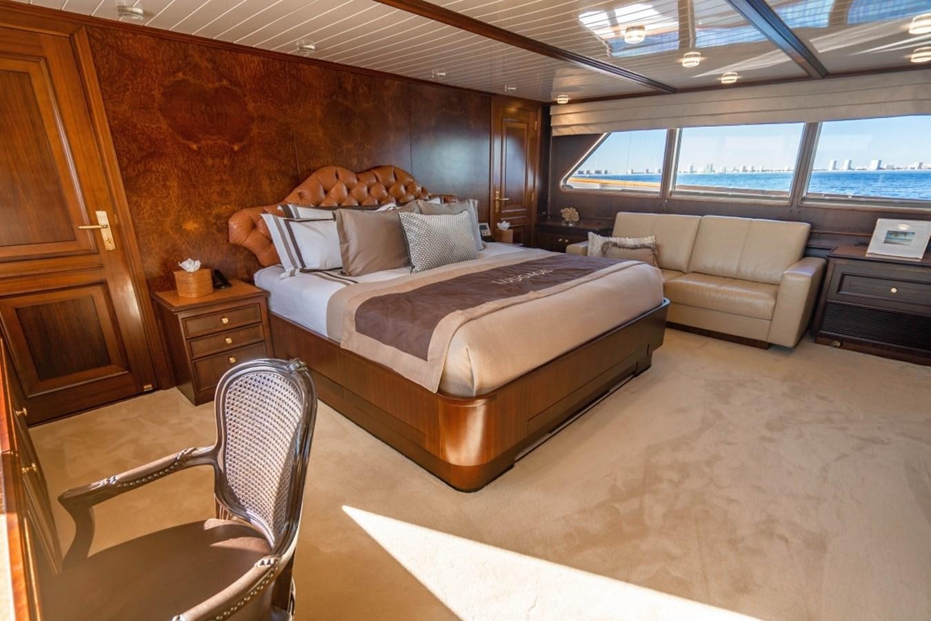 a bed in a room aboard DRAMA QUEEN Yacht for Sale