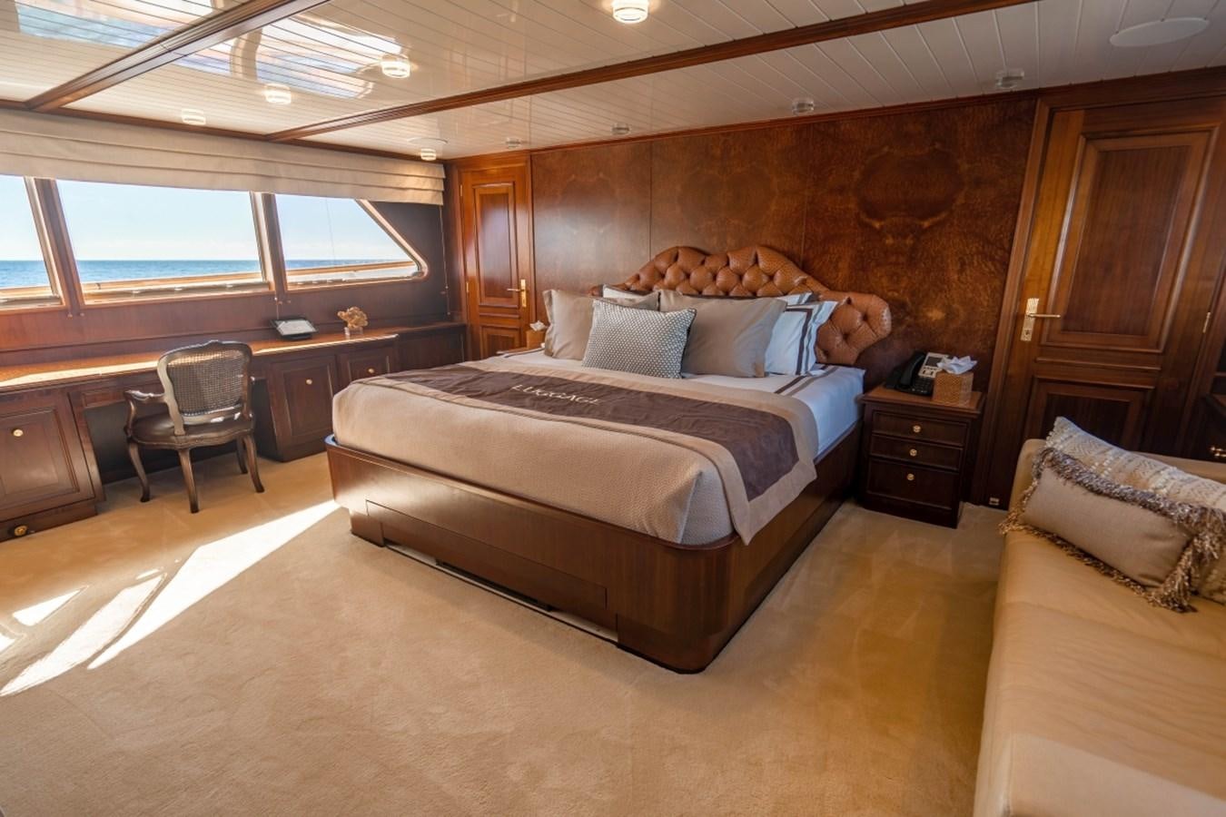 a bed in a room aboard DRAMA QUEEN Yacht for Sale