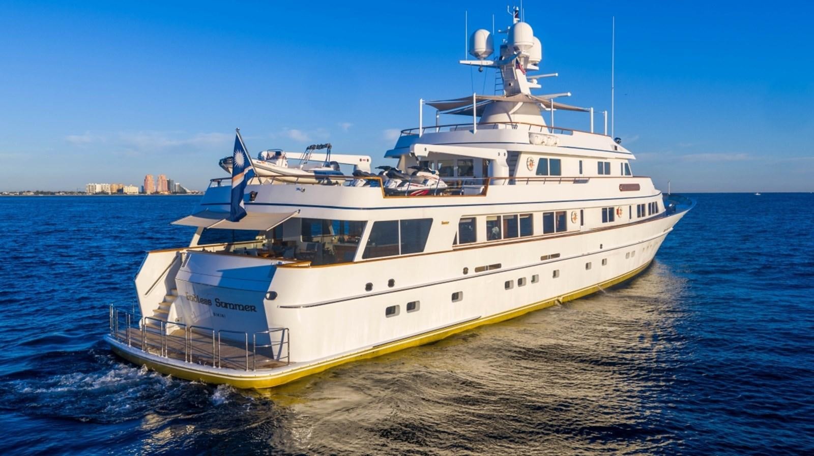a large white boat on the water aboard DRAMA QUEEN Yacht for Sale