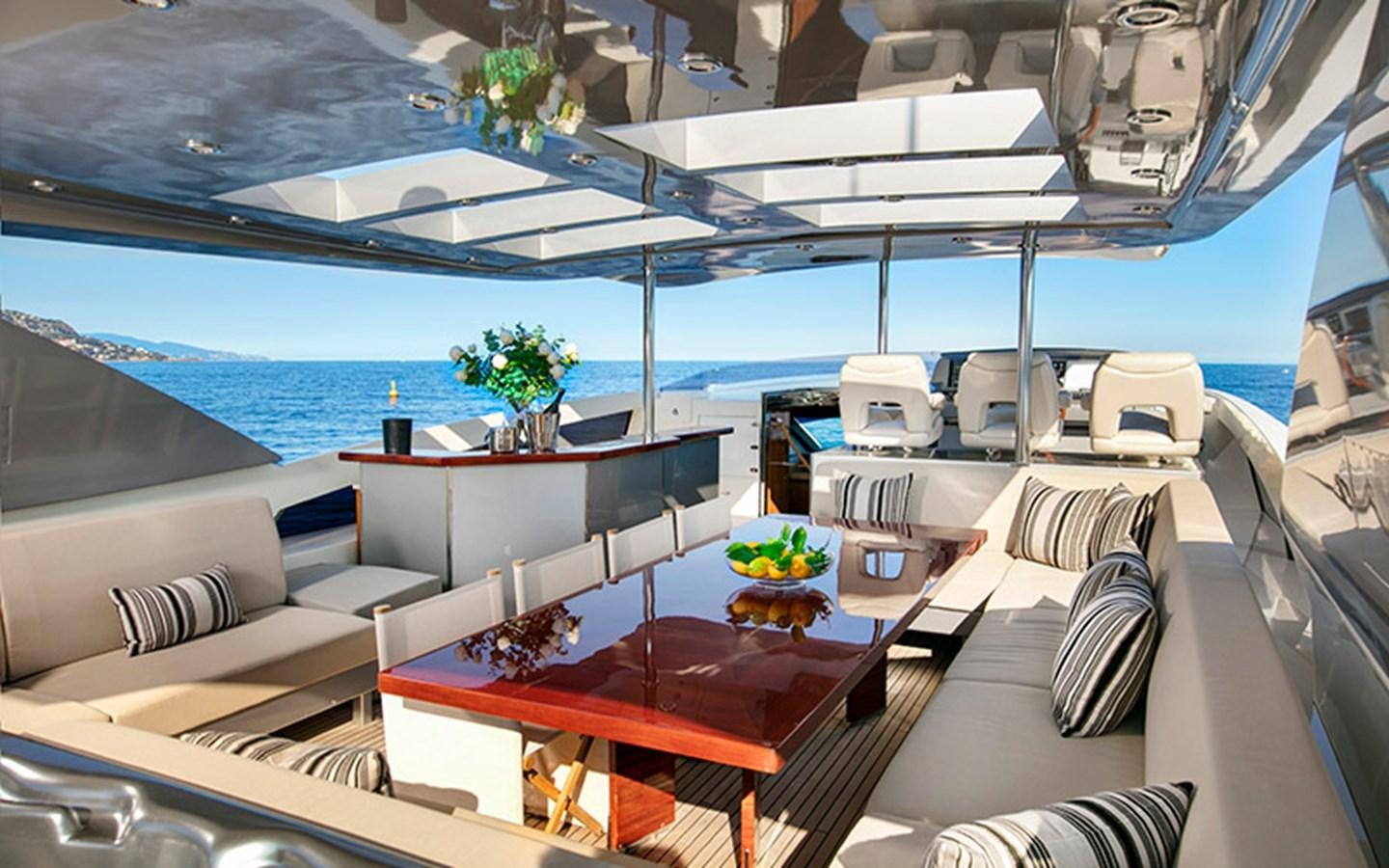 a room with a large pool aboard NYOTA Yacht for Charter