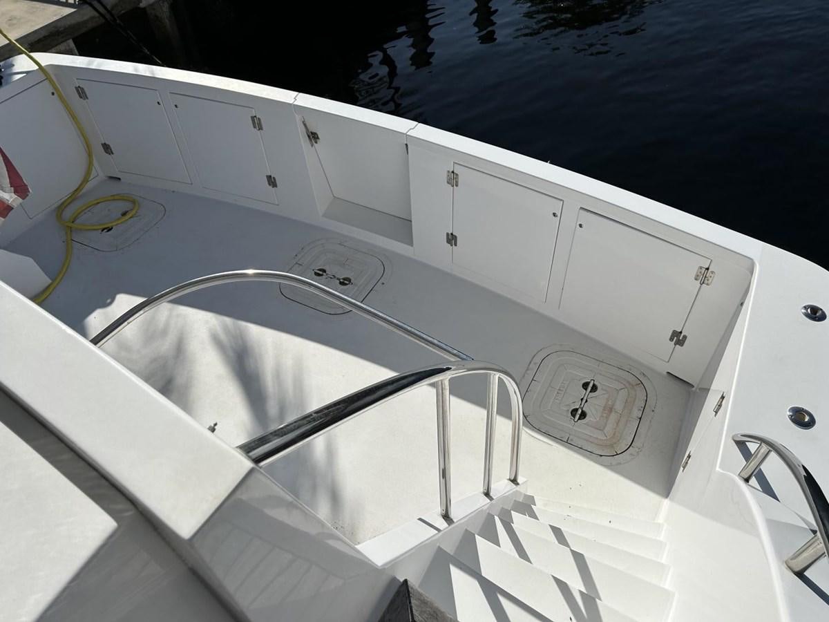 a white boat with a metal frame aboard GLEN ELLEN Yacht for Sale