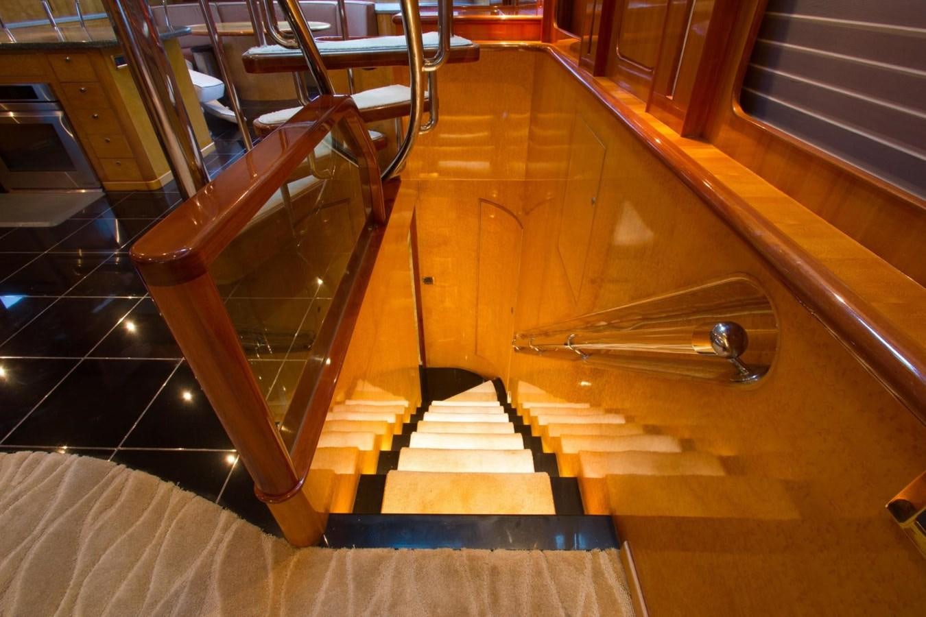a wooden staircase in a building aboard GLEN ELLEN Yacht for Sale