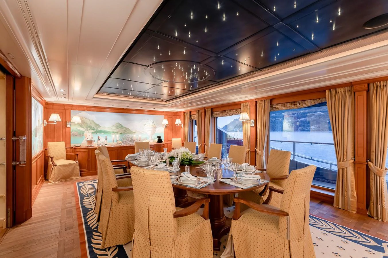 a dining room with a table and chairs aboard CARINTHIA VII Yacht for Charter