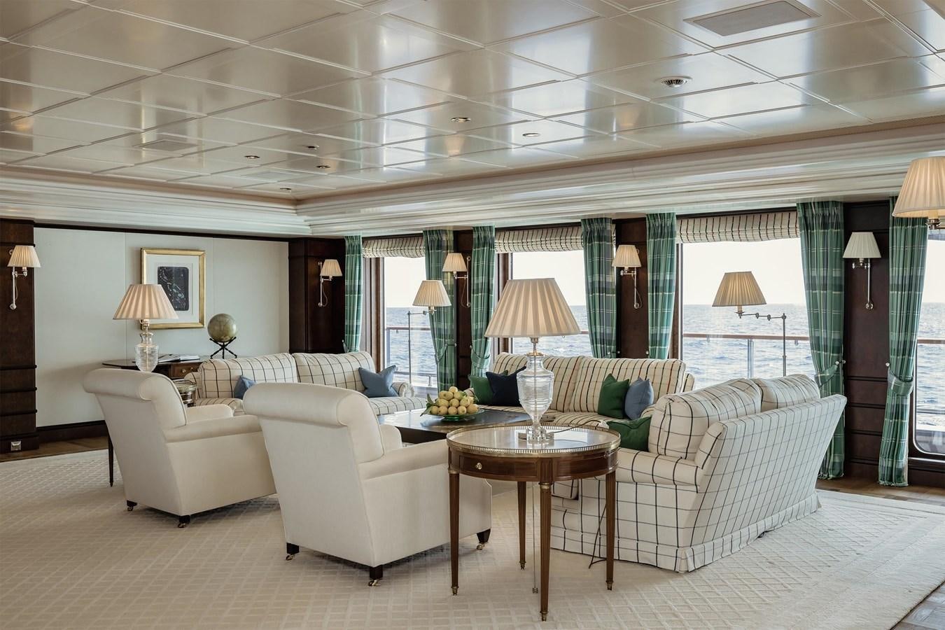 a living room with a large window aboard CARINTHIA VII Yacht for Sale