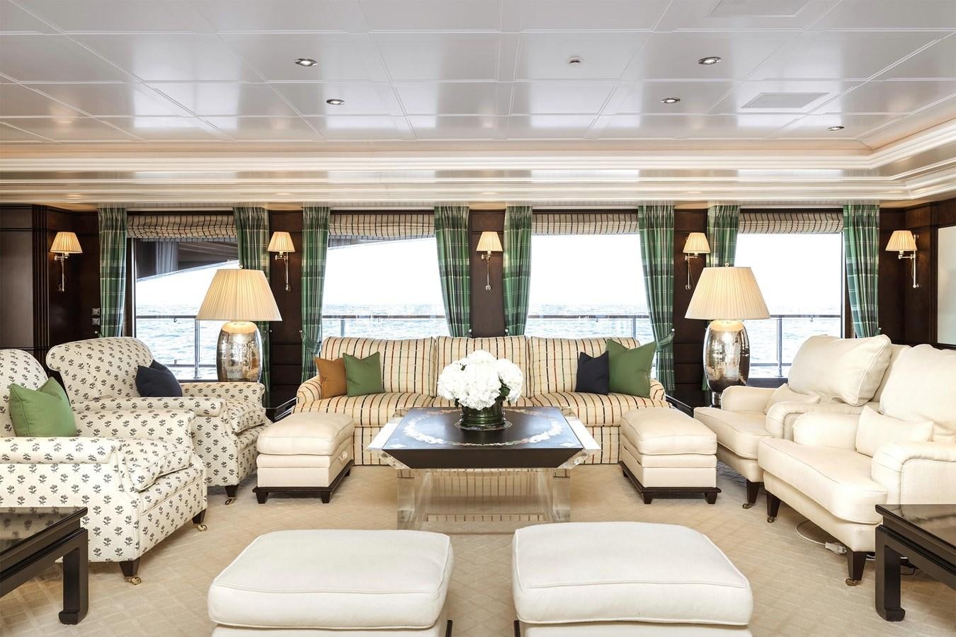 a living room with a large window aboard CARINTHIA VII Yacht for Sale