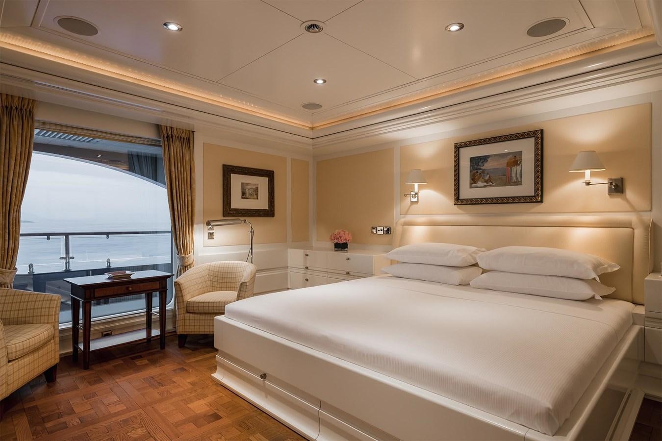 a large bedroom with a large bed aboard CARINTHIA VII Yacht for Sale