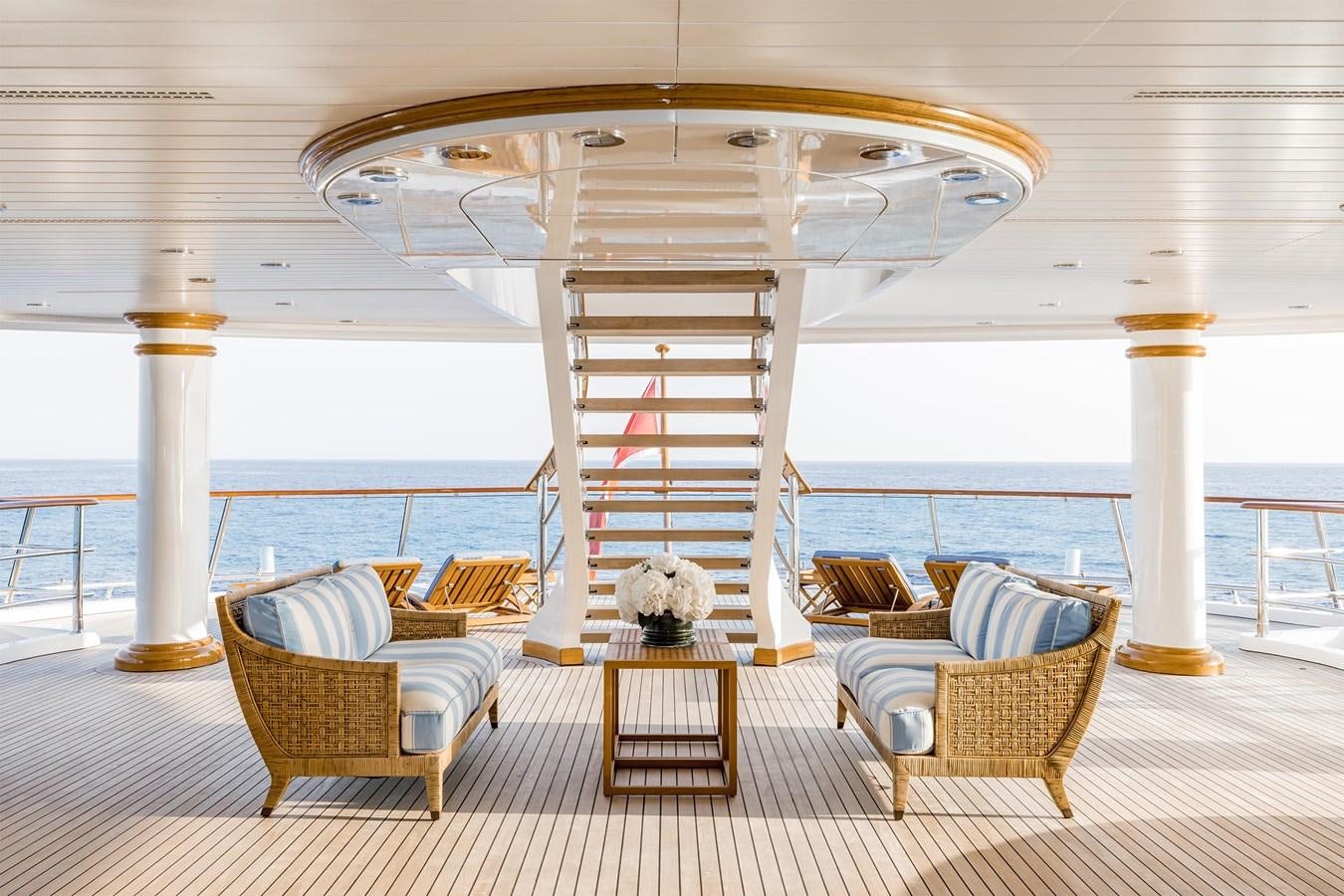 a large room with a large gazebo and a table and chairs aboard CARINTHIA VII Yacht for Sale