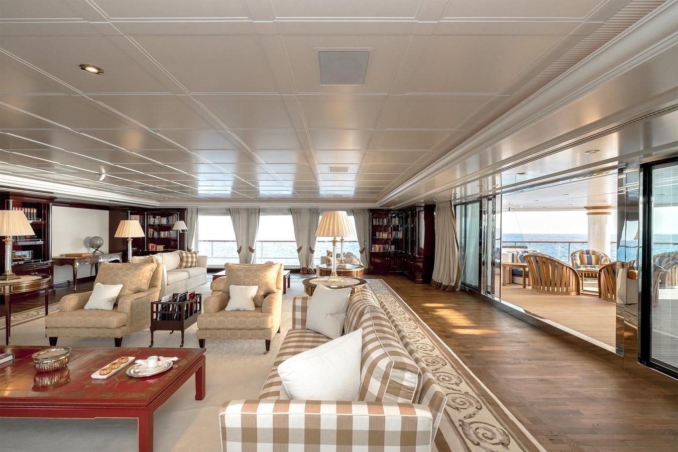 a living room with a large mirror aboard CARINTHIA VII Yacht for Sale