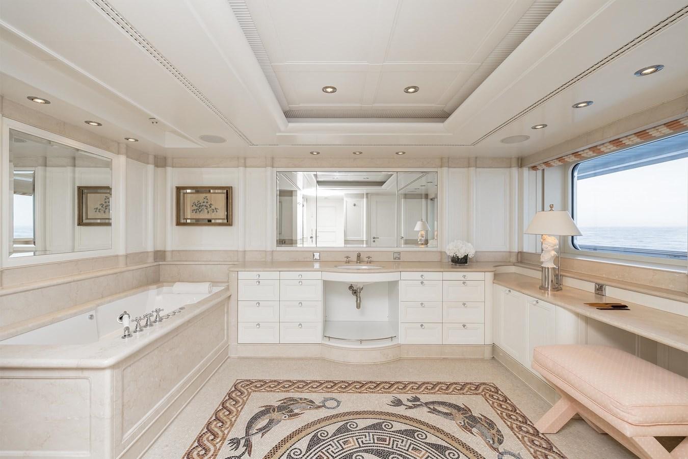 a large bathroom with a tub aboard CARINTHIA VII Yacht for Sale