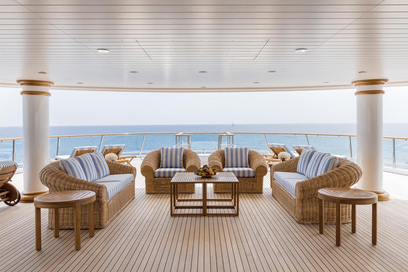 a living room with a large window aboard CARINTHIA VII Yacht for Sale