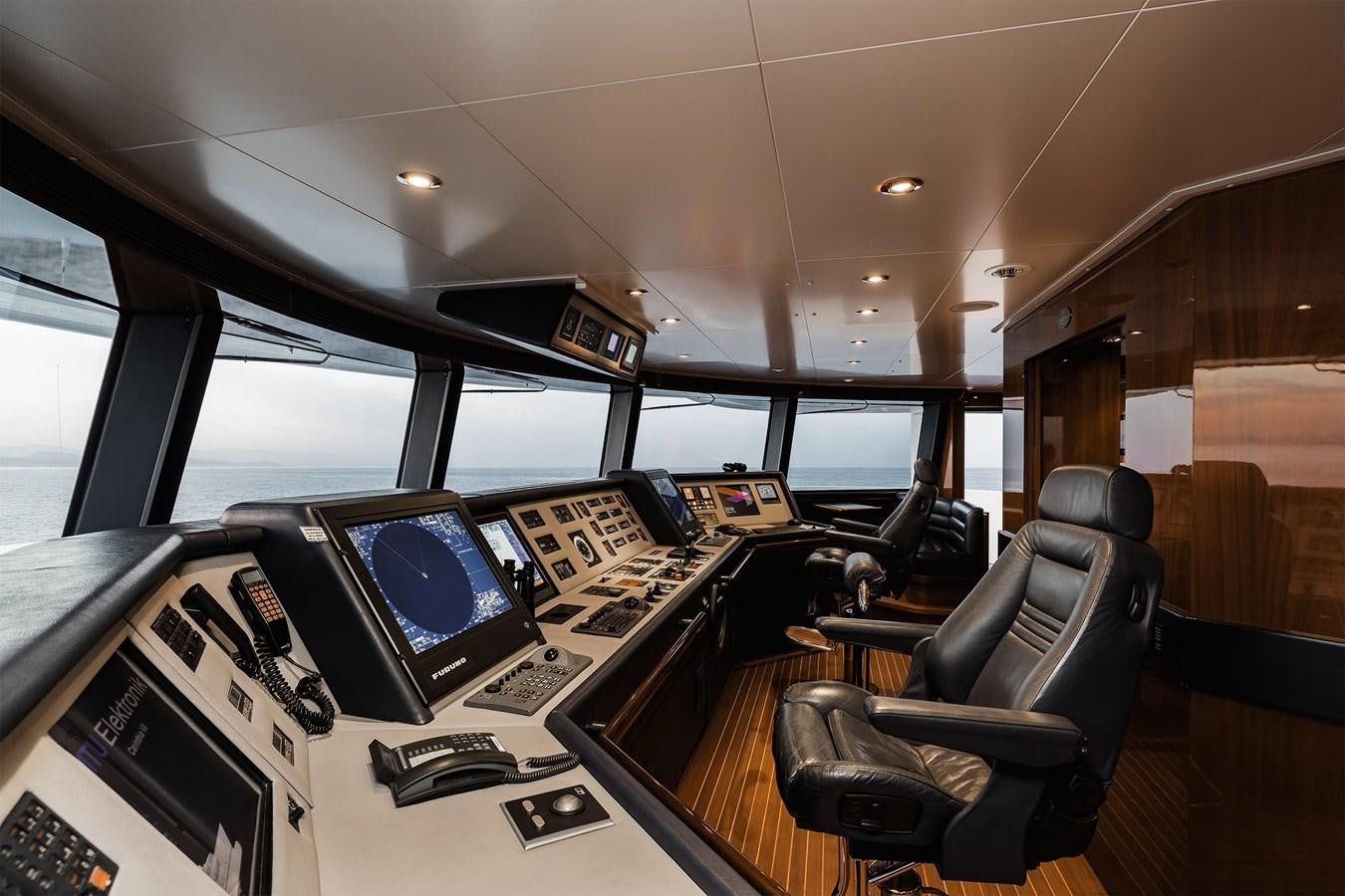 inside of a vehicle with computers and monitors aboard CARINTHIA VII Yacht for Sale