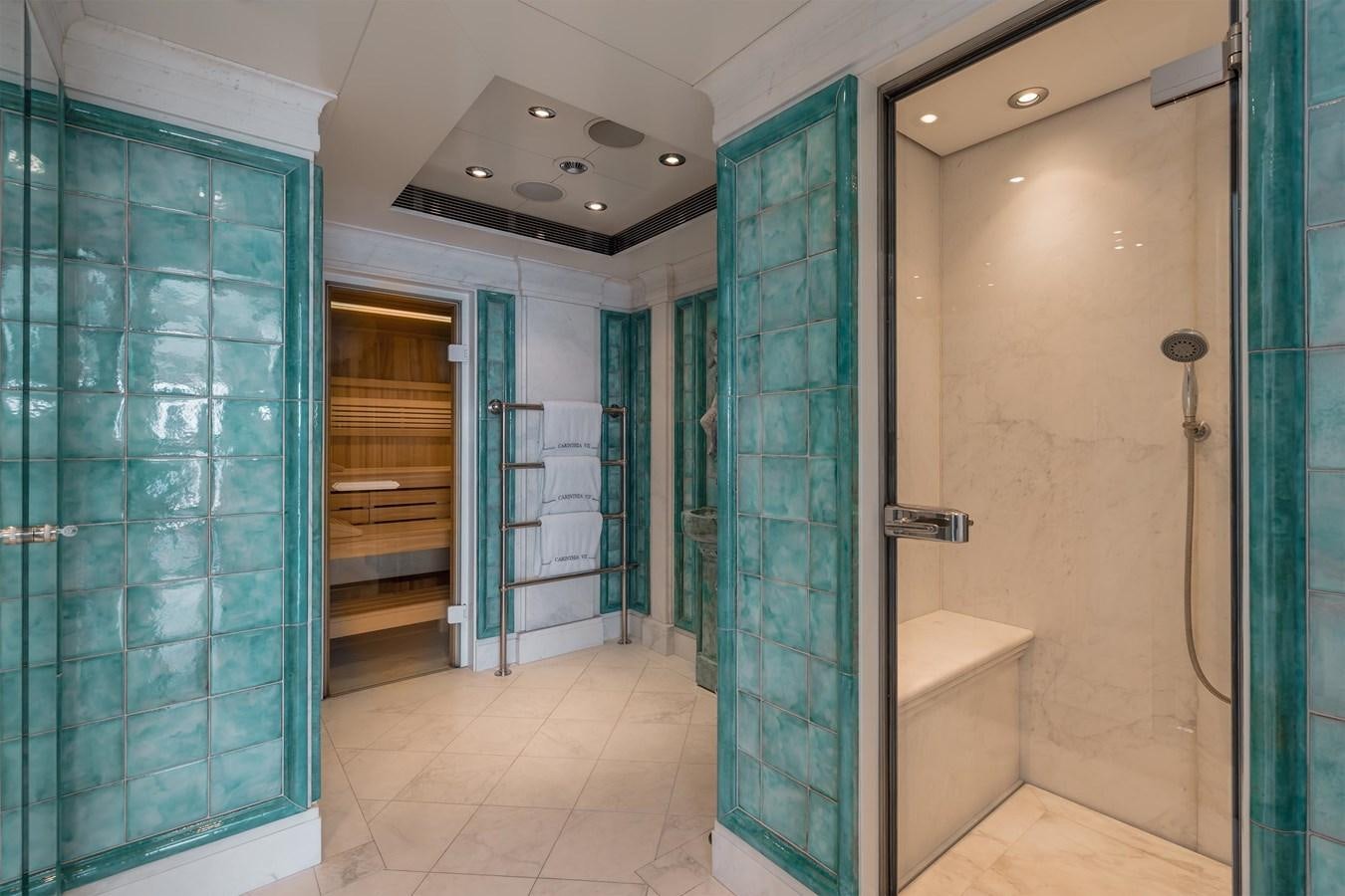 a bathroom with a shower and a tub aboard CARINTHIA VII Yacht for Sale