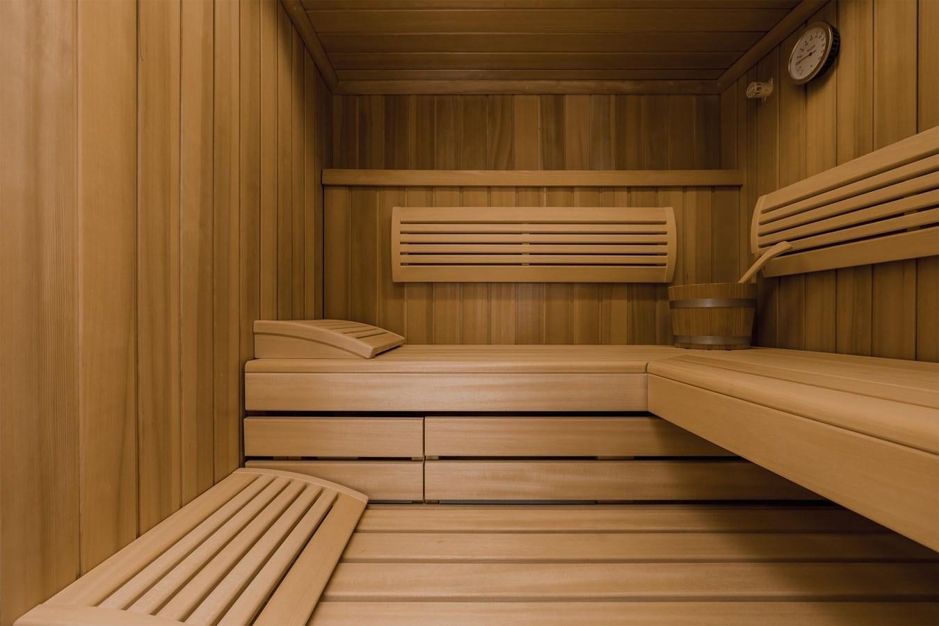 a room with wooden stairs aboard CARINTHIA VII Yacht for Sale