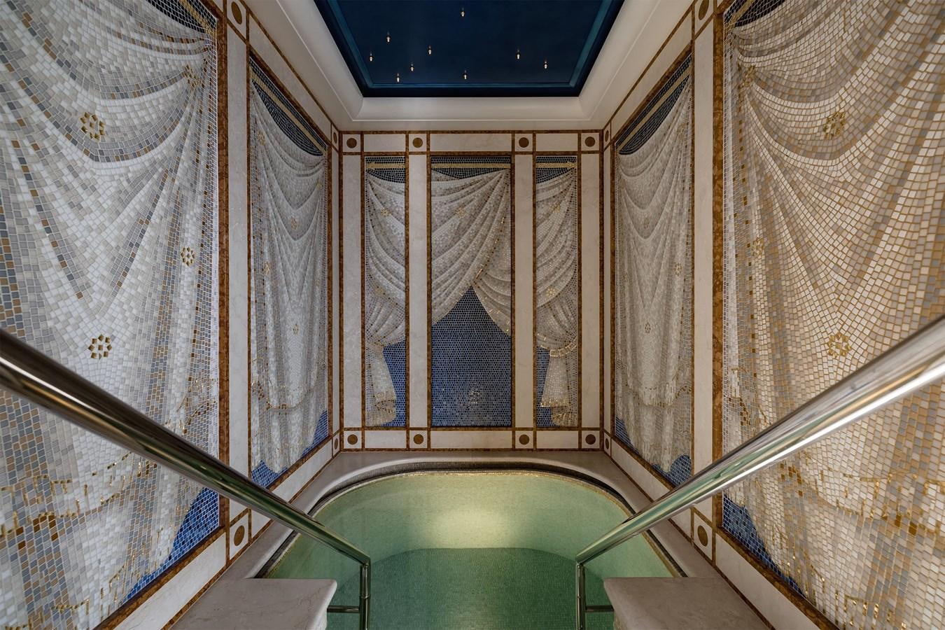 a room with a window and curtains aboard CARINTHIA VII Yacht for Sale