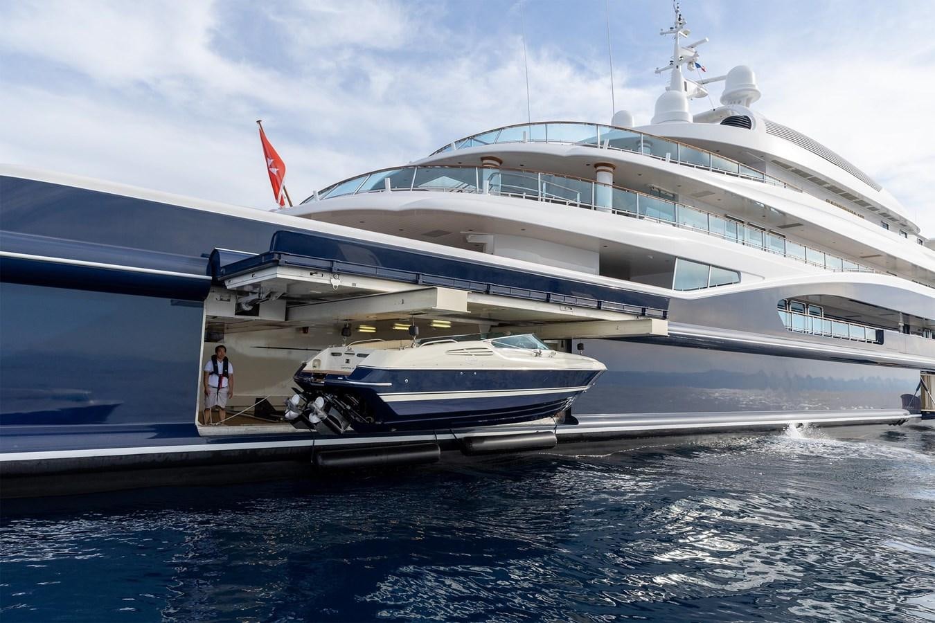a couple of large yachts in the water aboard CARINTHIA VII Yacht for Sale