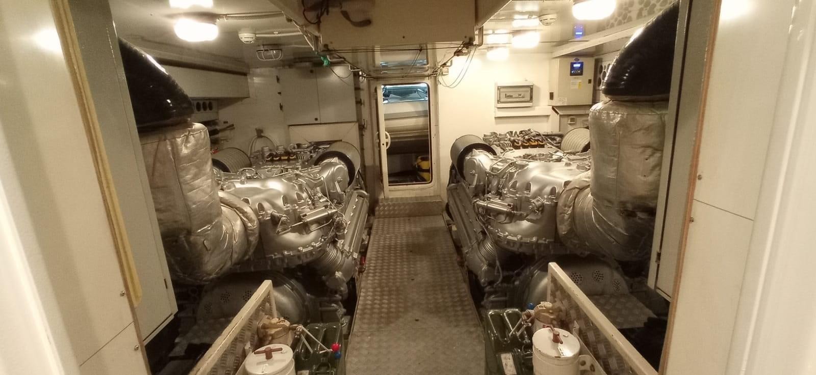 a hallway with a lot of cars aboard MATHISSE Yacht for Sale