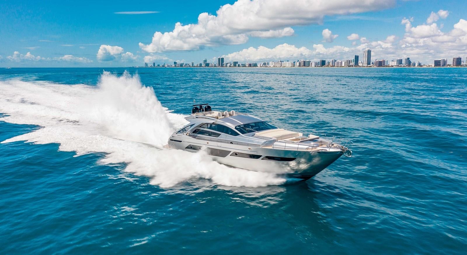 a white yacht on the water aboard LADY K Yacht for Sale