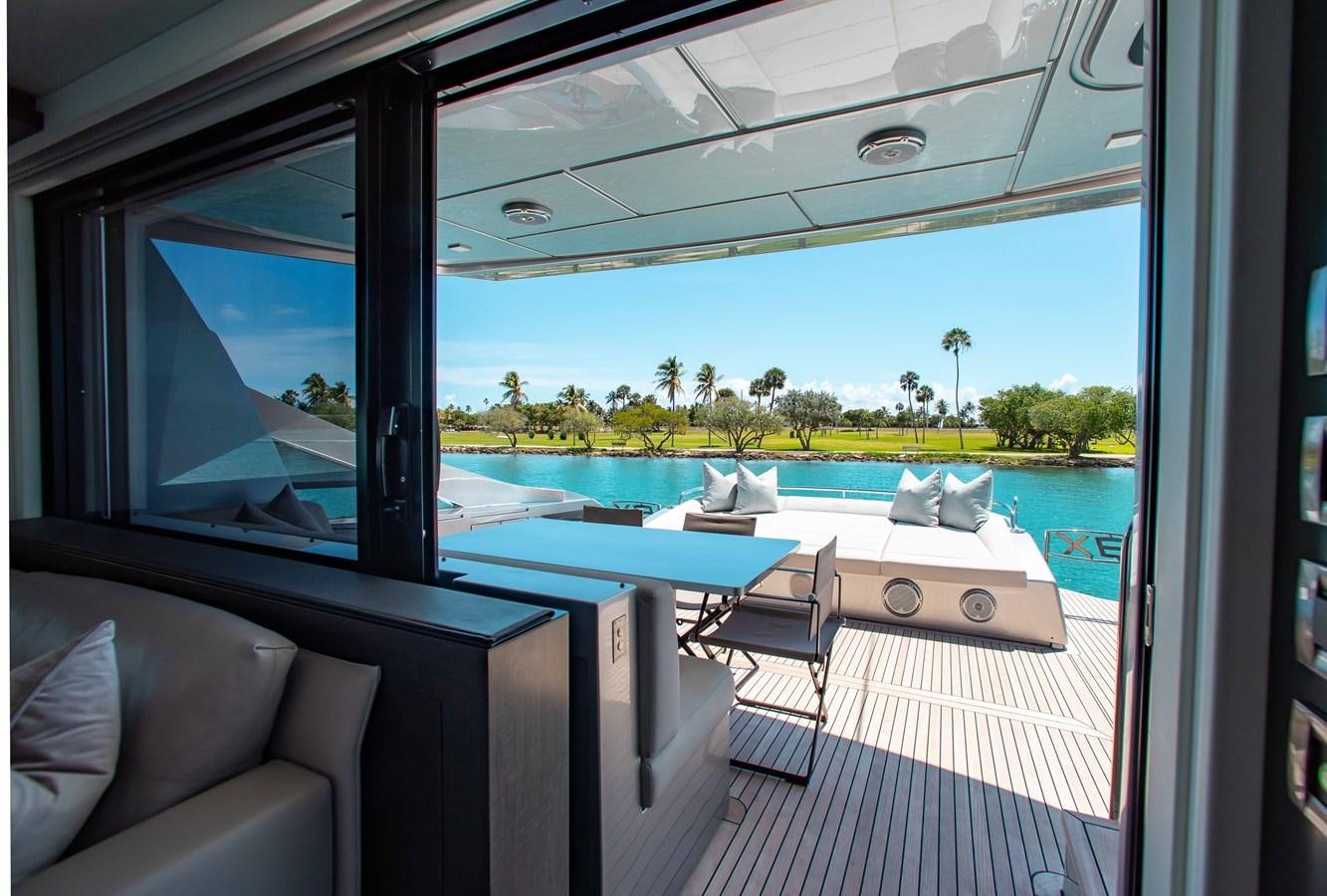 a boat on a deck aboard LADY K Yacht for Sale